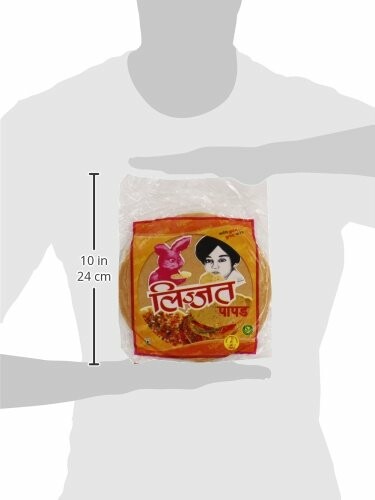 Lijjat Papad packaging held by a person